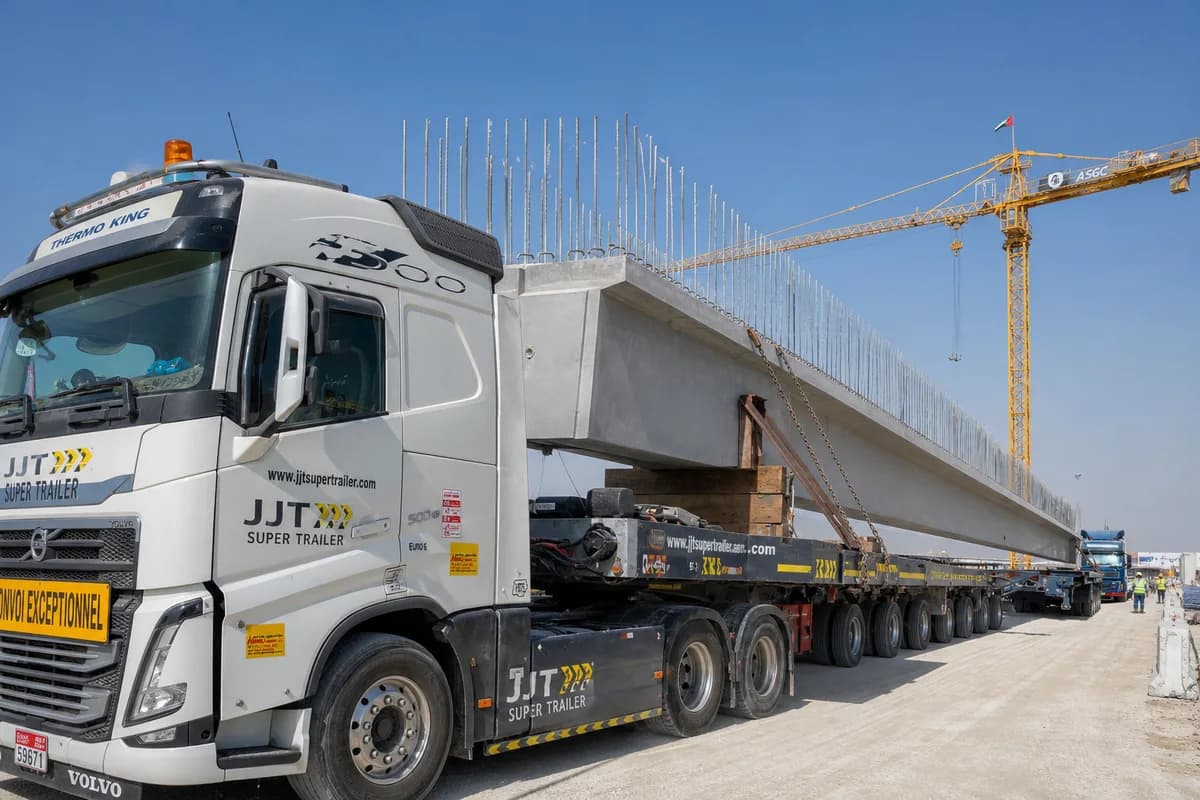 JJT Super Trailer transporting a record-length precast bridge girder — Breaking Records